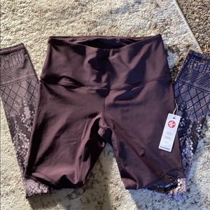 Brand new maroon/snake skin print leggings.